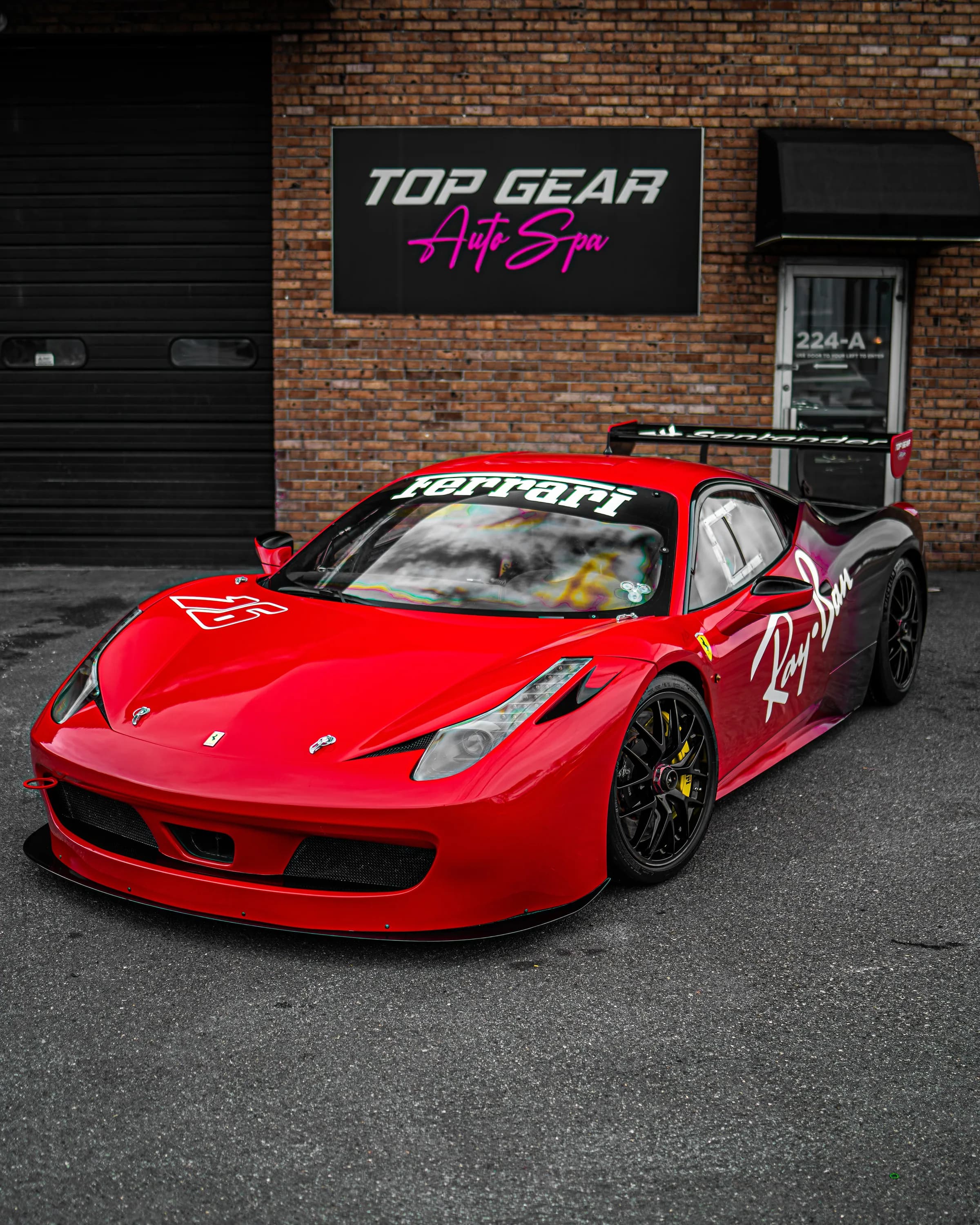 Red Ferrari finished in a full vinyl wrap